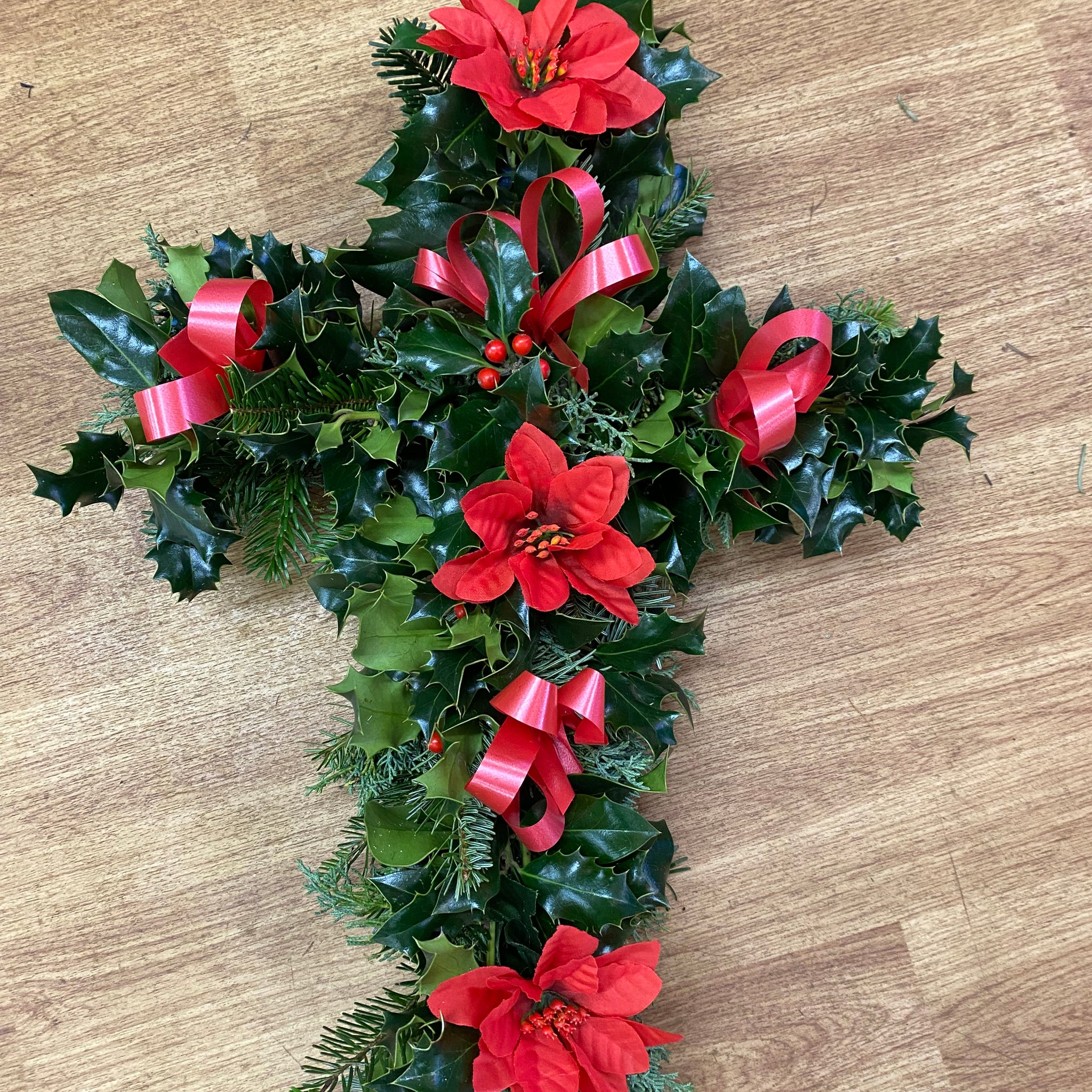 Decorated holly cross